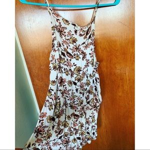 Floral romper w/ lacy back